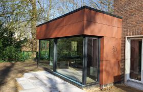 Image - Fassadenverkleidung mit imi-Rost Verbundstoff